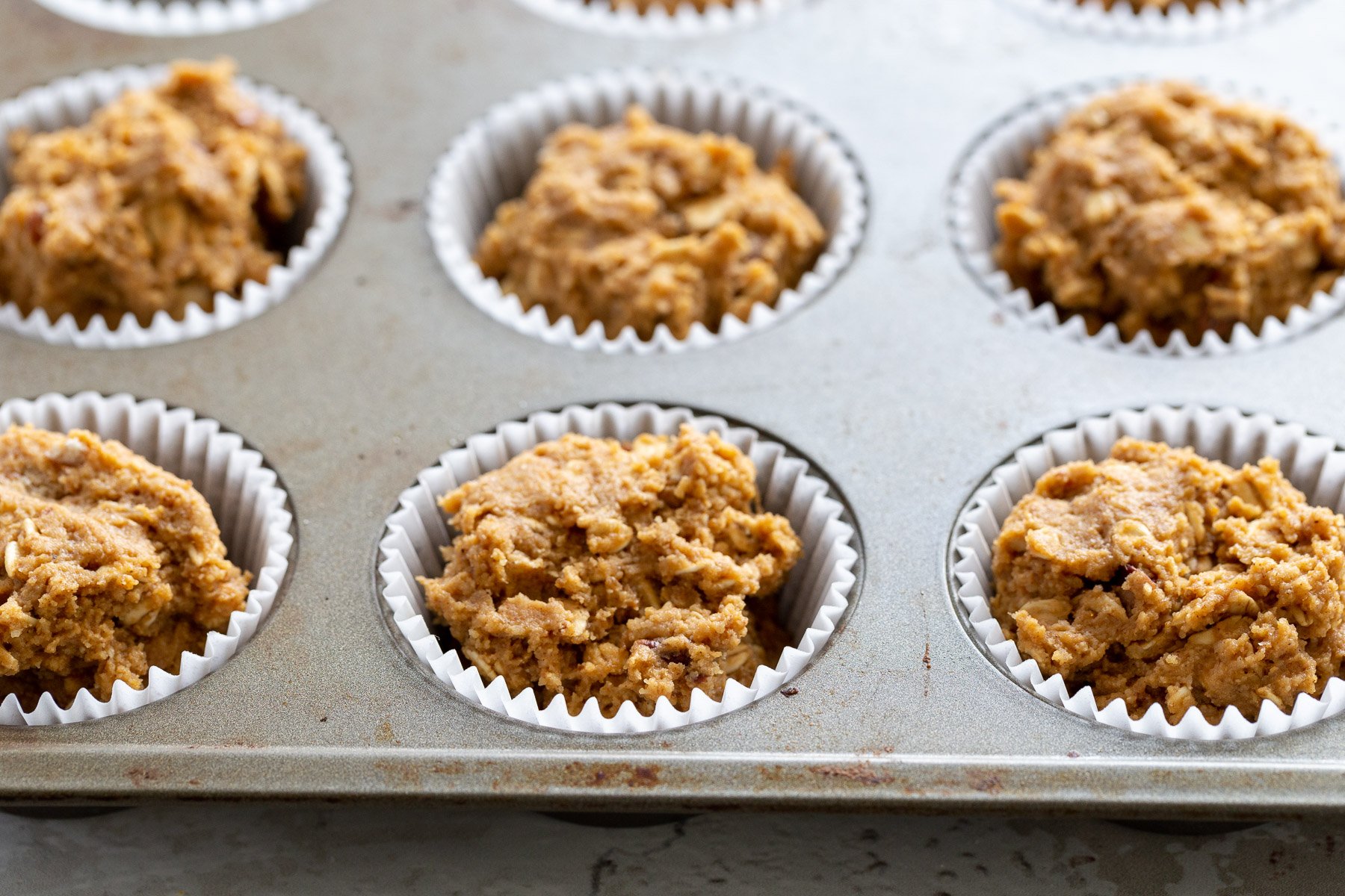 gluten free pumpkin muffins in muffin pan