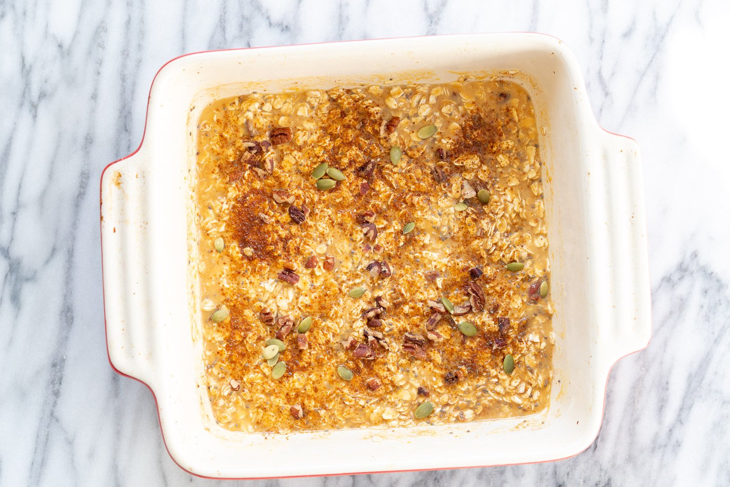 Pumpkin Oatmeal Mixture in a baking dish ready tobake