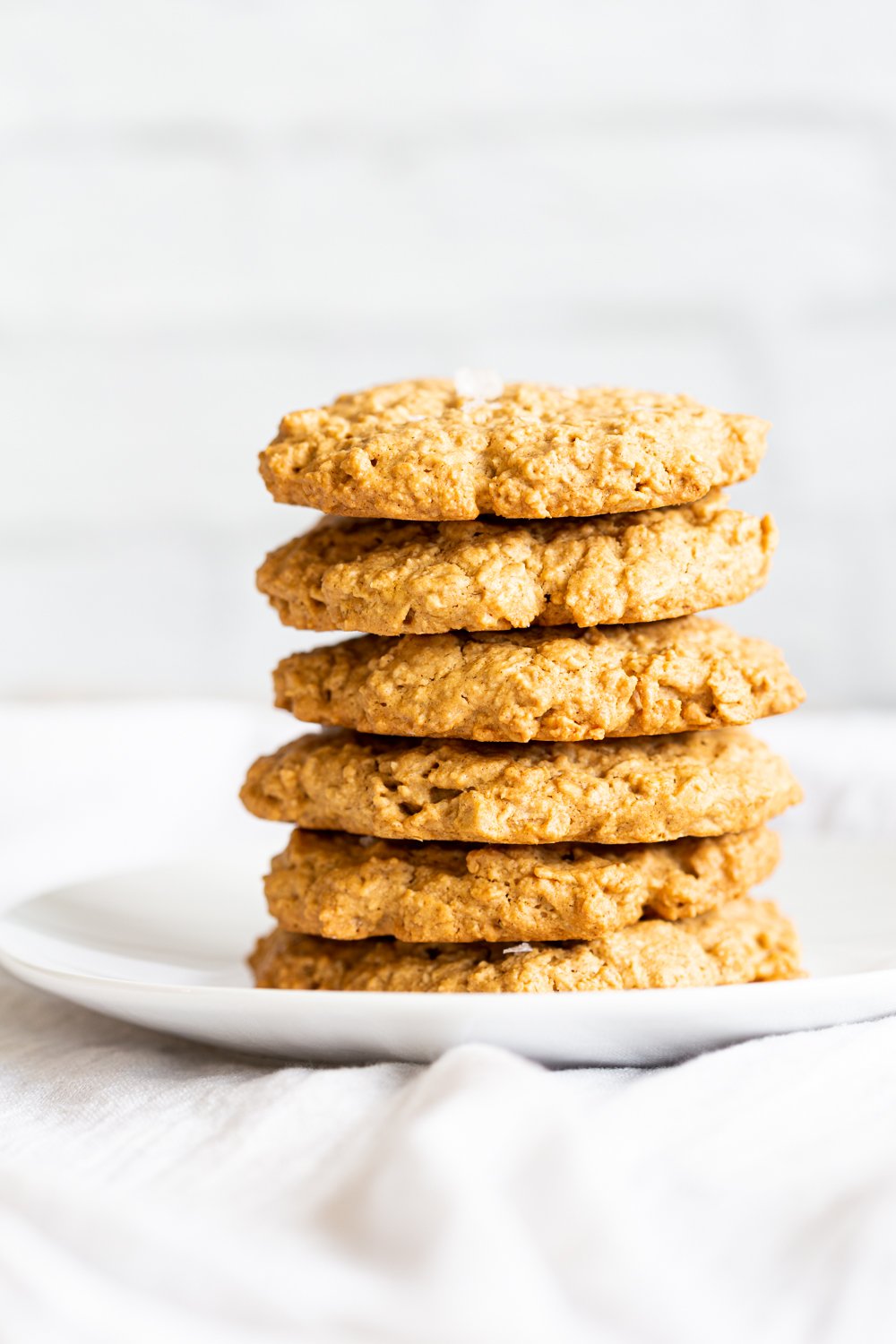 Our Vegan Gluten-free Tahini Oatmeal Cookies on a white plate