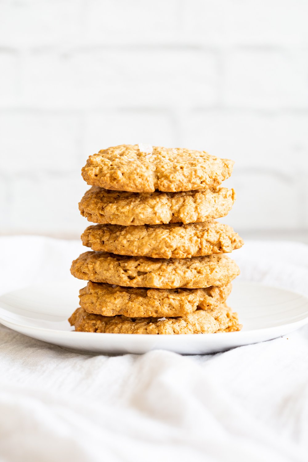Our Vegan Gluten-free Tahini Oatmeal Cookies on a white plate
