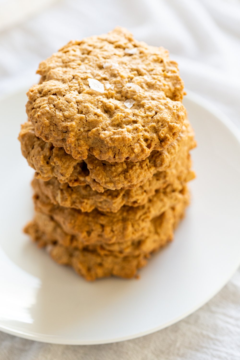 Our Vegan Gluten-free Tahini Oatmeal Cookies on a white plate