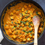 Tofu and Cauliflower in Kohlapuri Sauce in a Black skillet