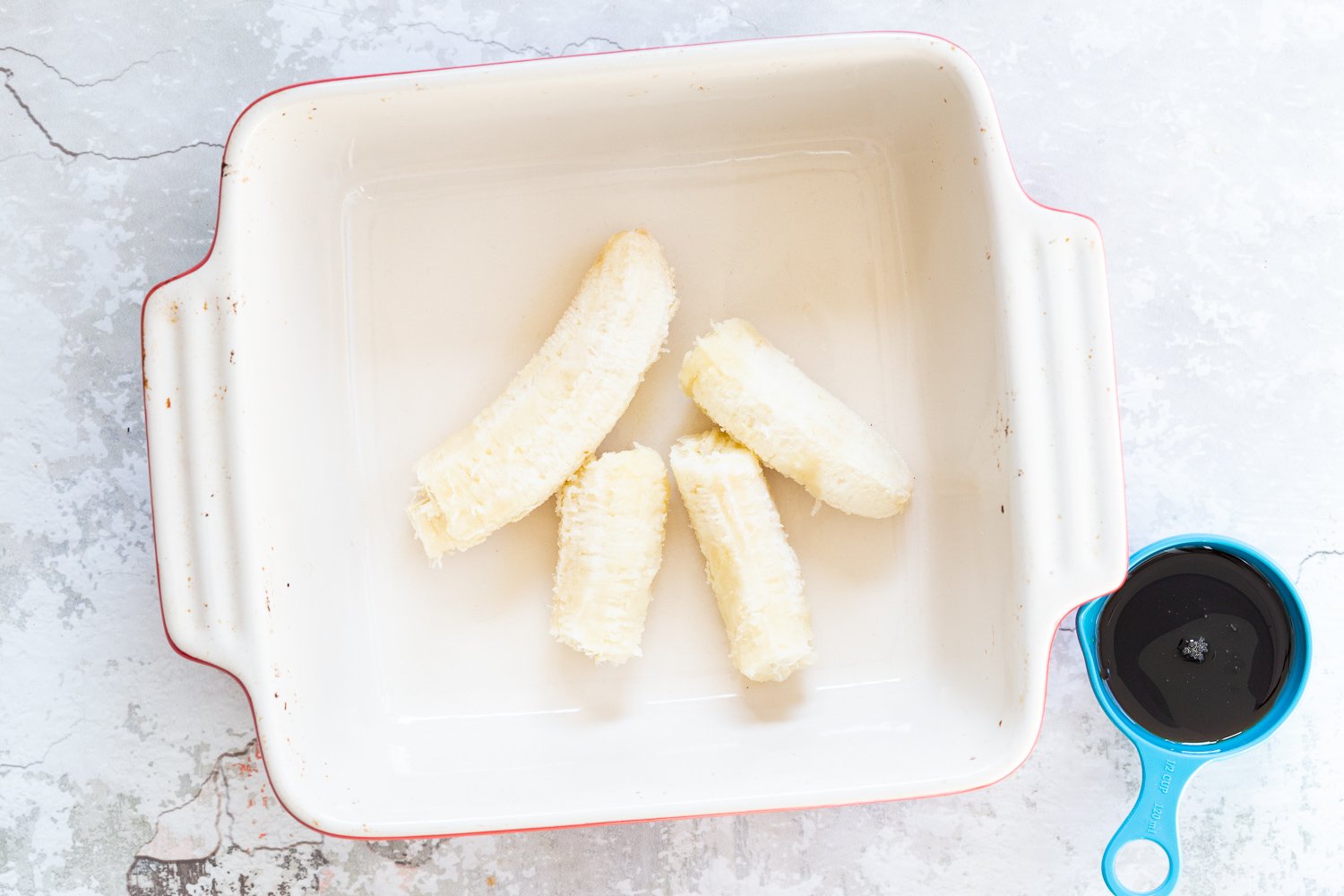 Bananas for Our Vegan Banana Bread Baked Oatmeal in a white baking dish