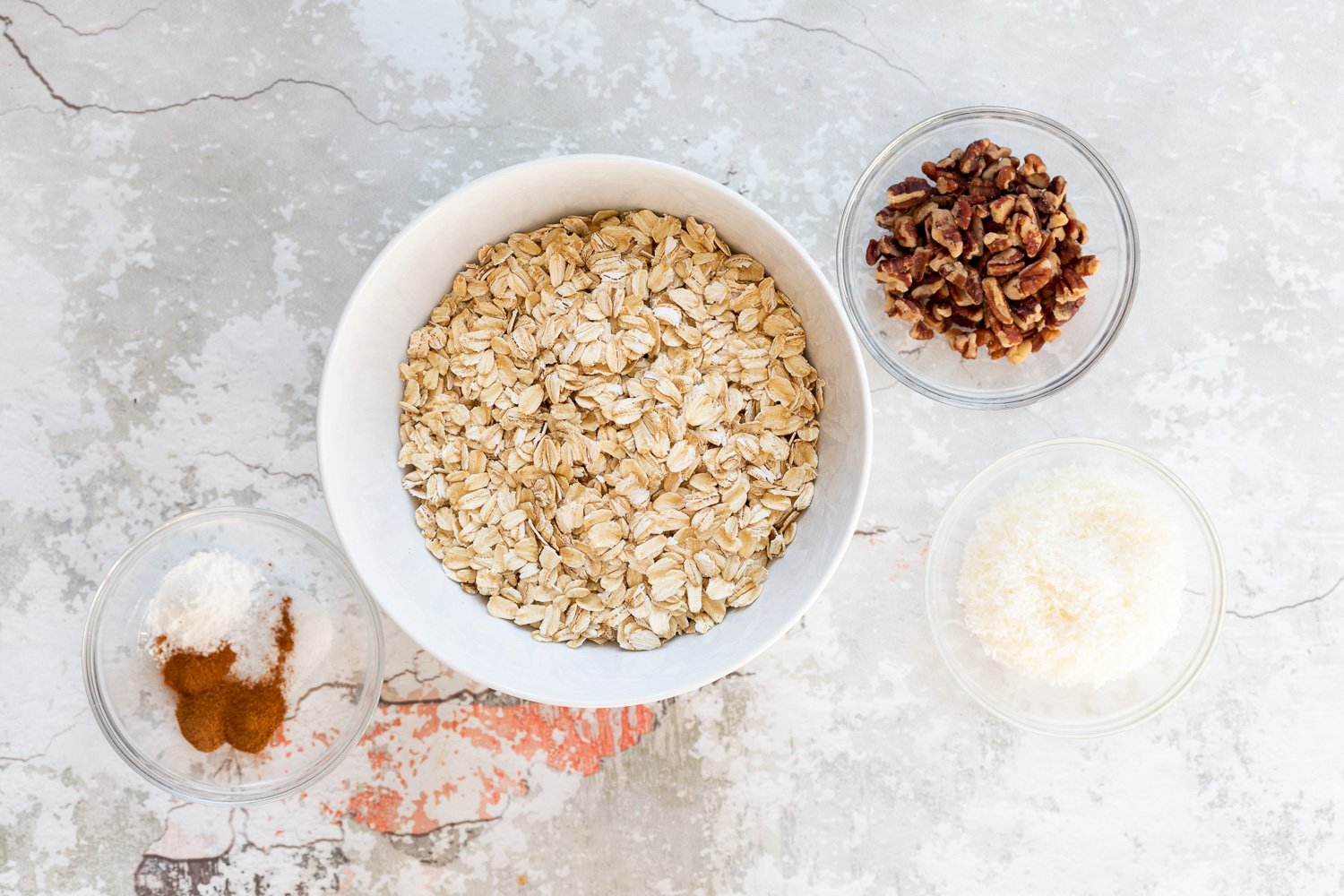 Ingredients for Our Vegan Banana Bread Baked Oatmeal in a white bowls