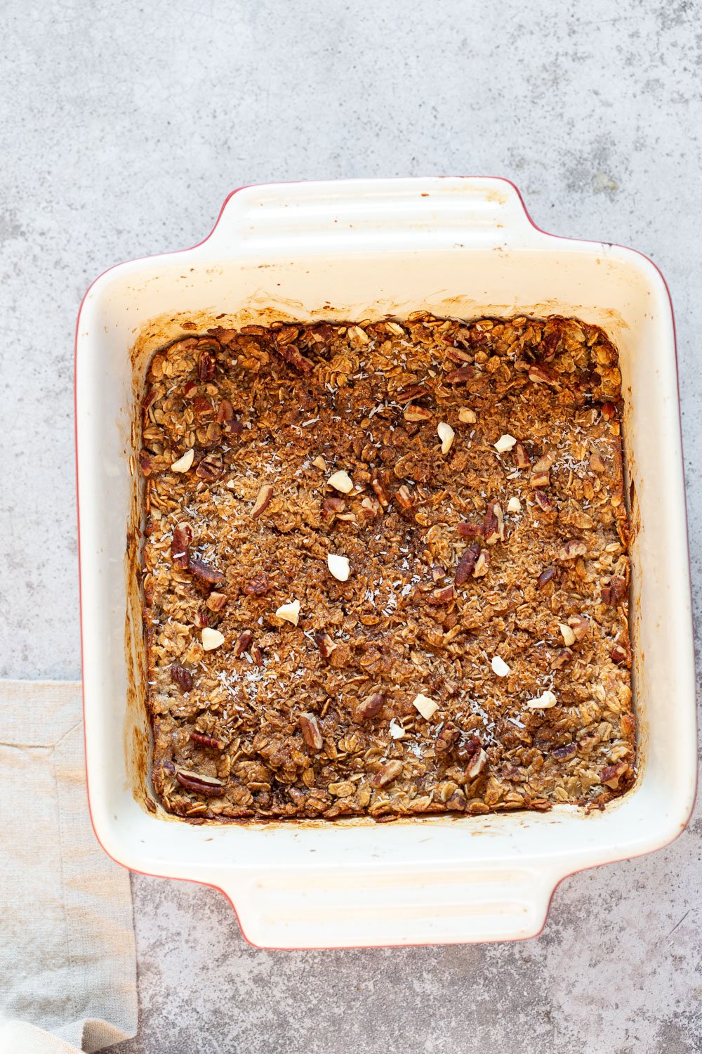 Our Vegan Banana Bread Baked Oatmeal in a white baking dish