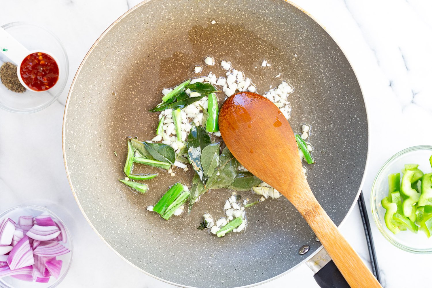 Sauce for Tofu 65 in a grey skillet