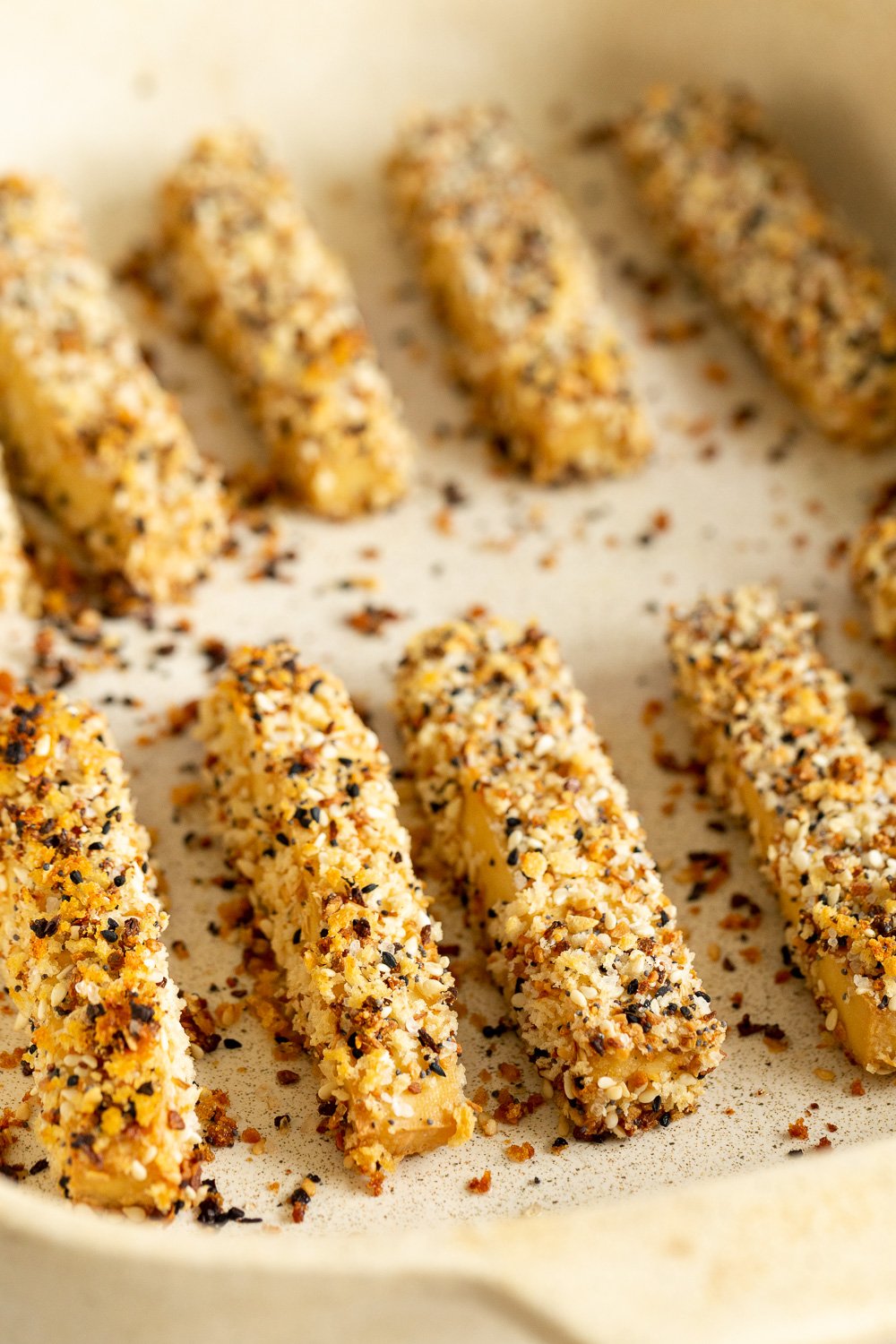 Our Breaded Everything Bagel Tofu in parchment lined baking dish