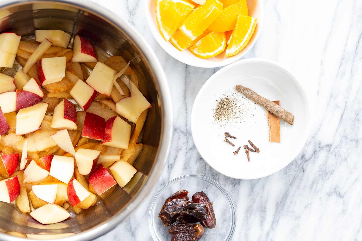 Ingredients for Instant Pot Apple Cider in Bowls
