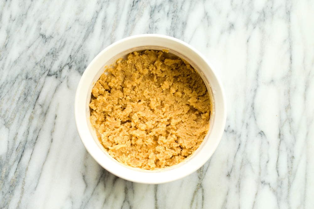 Almond Mixture for our Vegan Almond Halwa in a white baking dish