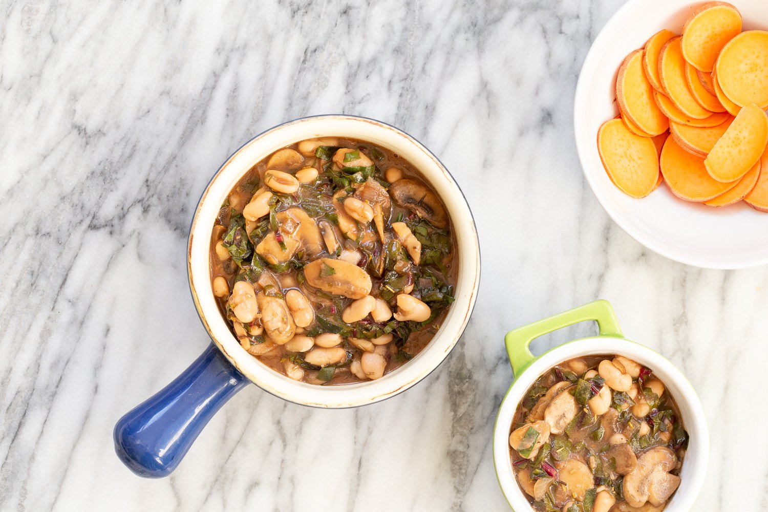 Our Vegan Mushroom Pot Pie in green and blue baking dishes