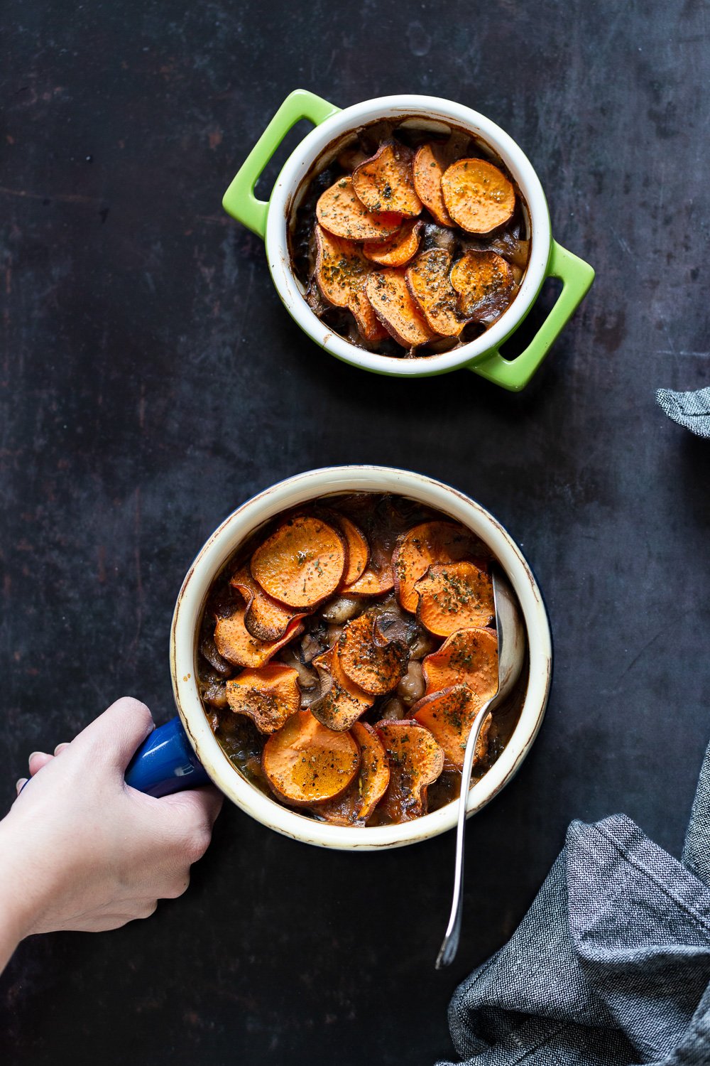 Our Vegan Mushroom Pot Pie in green and blue baking dishes