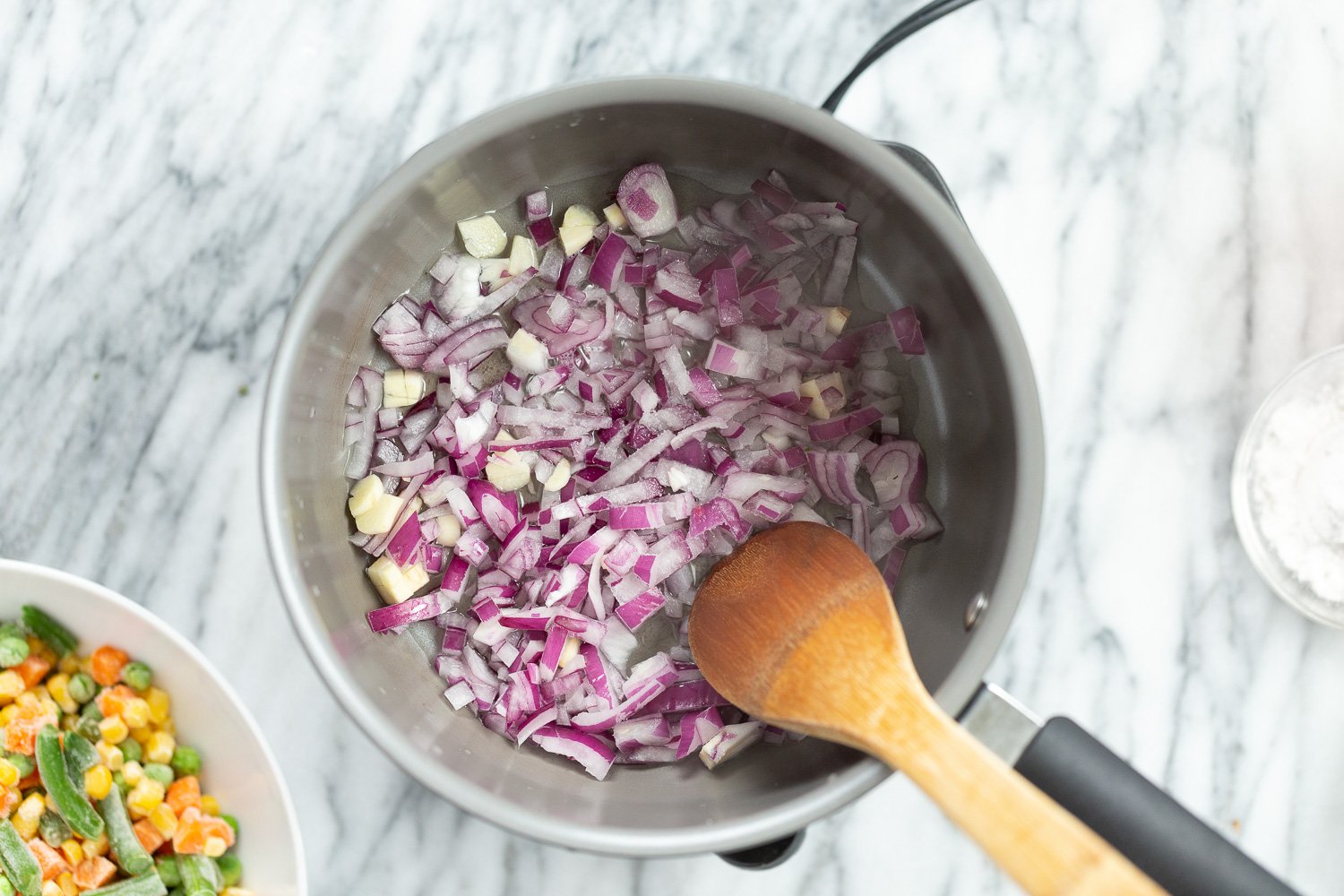 Onion and garlic in a saucepan