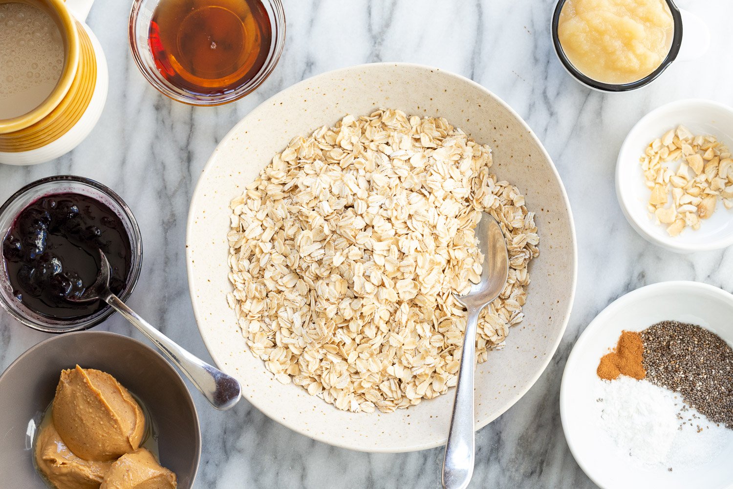 Ingredients for Peanut Butter and Jelly Oatmeal in Bowls