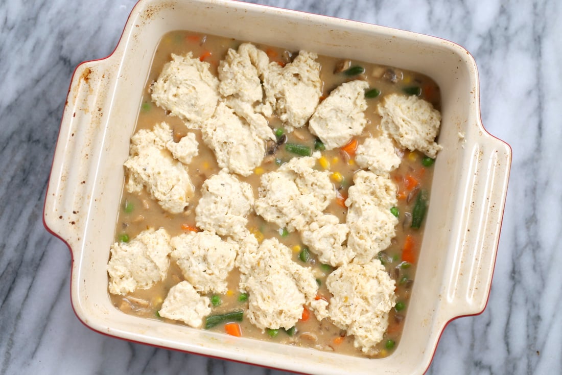 Our Vegan Pot Pie in an off- white baking dish