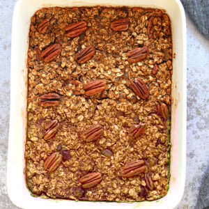 Vegan Gingerbread Baked Oatmeal in a white baking dish