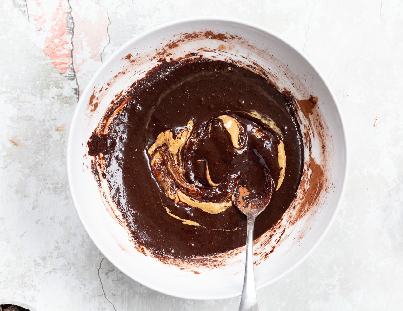 Batter for Vegan Brownie Cookies in a white bowl