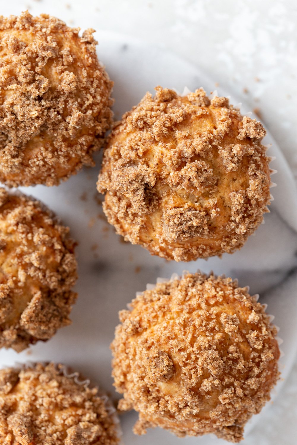 Vegan Banana Muffins on marble turn table