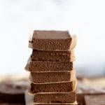 Vegan Chocolate Avocado Freezer Fudge Bars on parchment