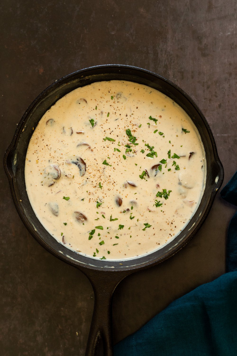 Creamy Vegan Mushroom Sauce in a cast iron skillet