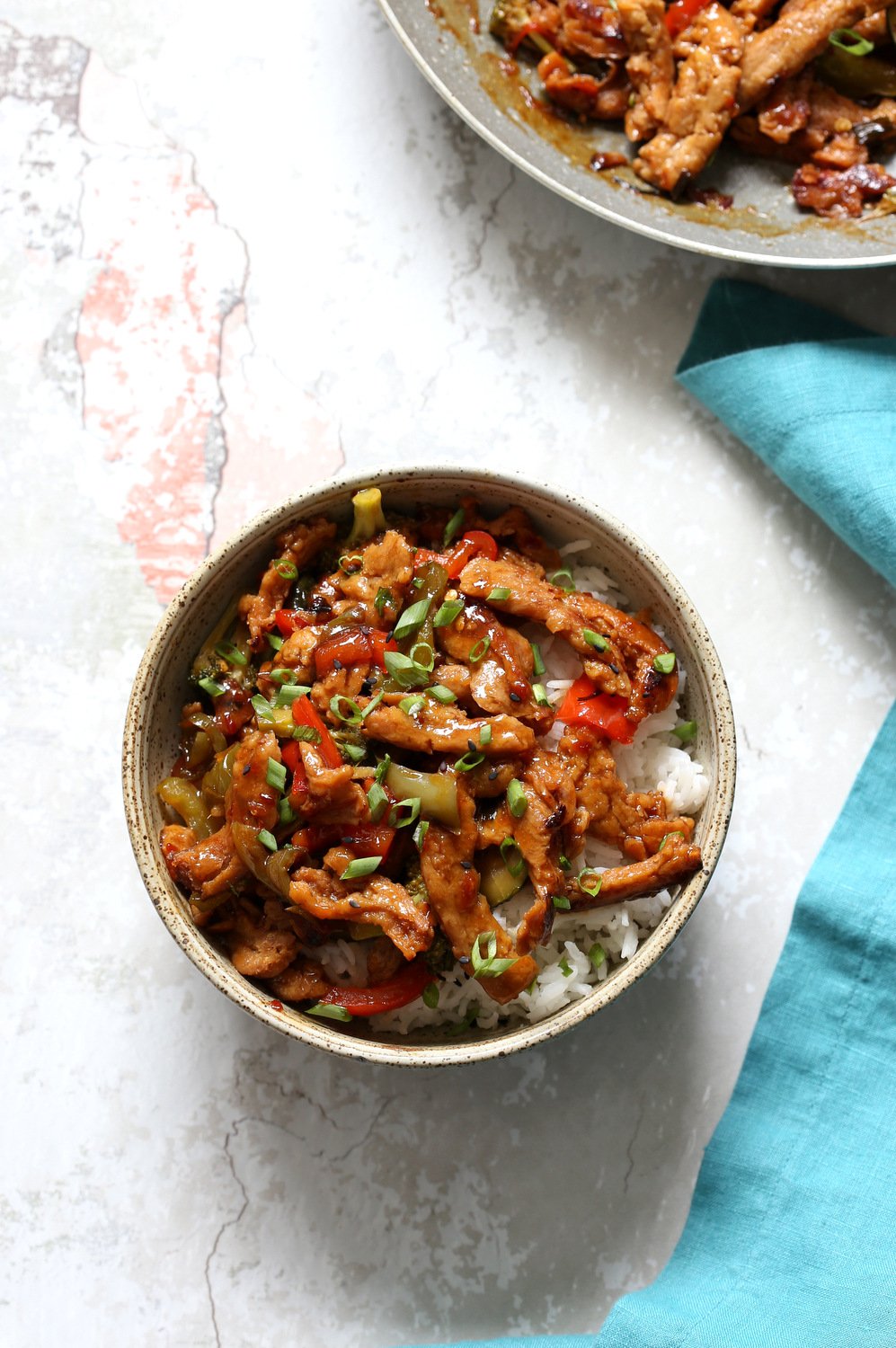 Vegan General Tso Soy curls in a speckled bowl