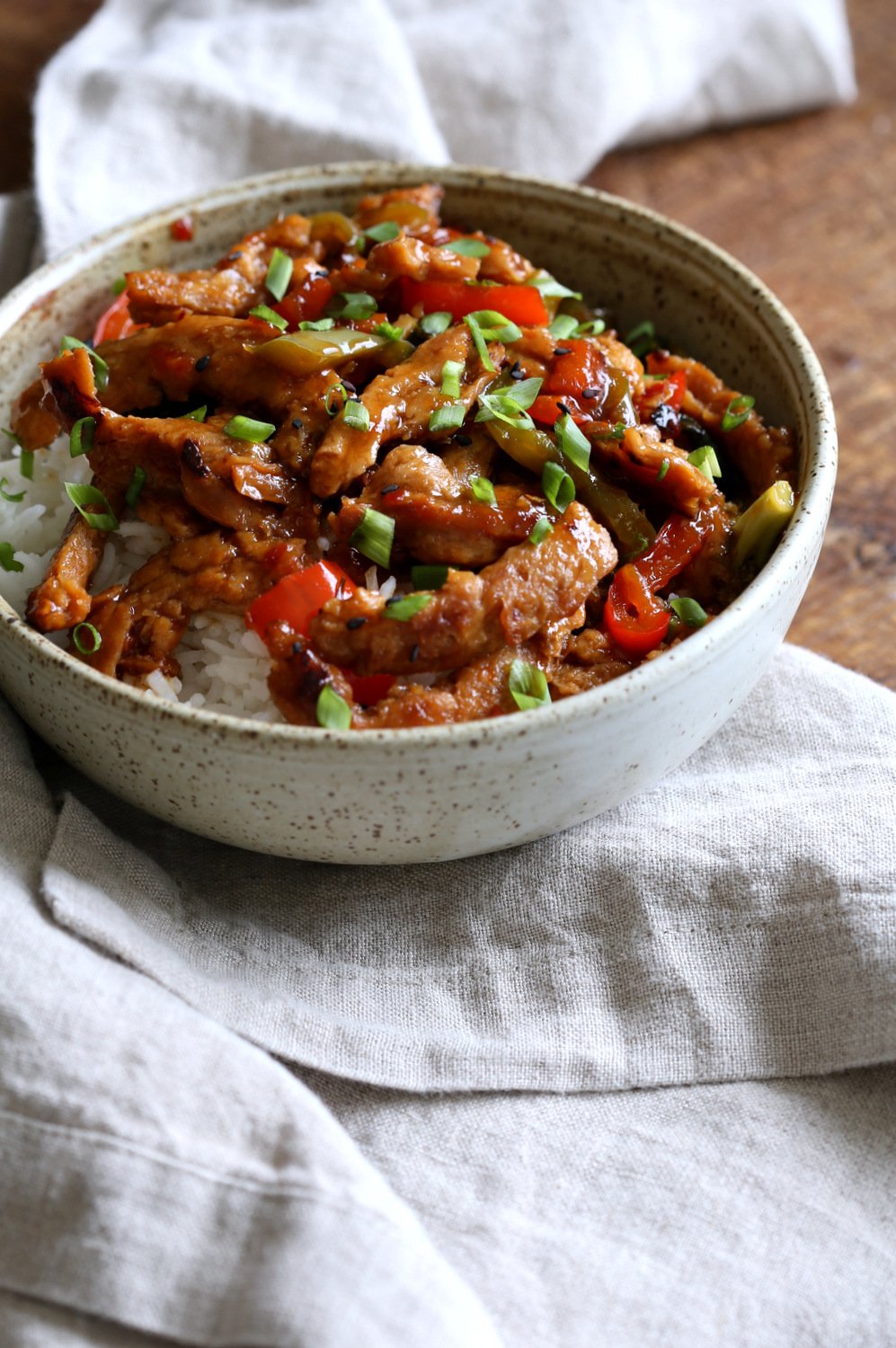 Vegan General Tso Soy curls in a speckled bowl