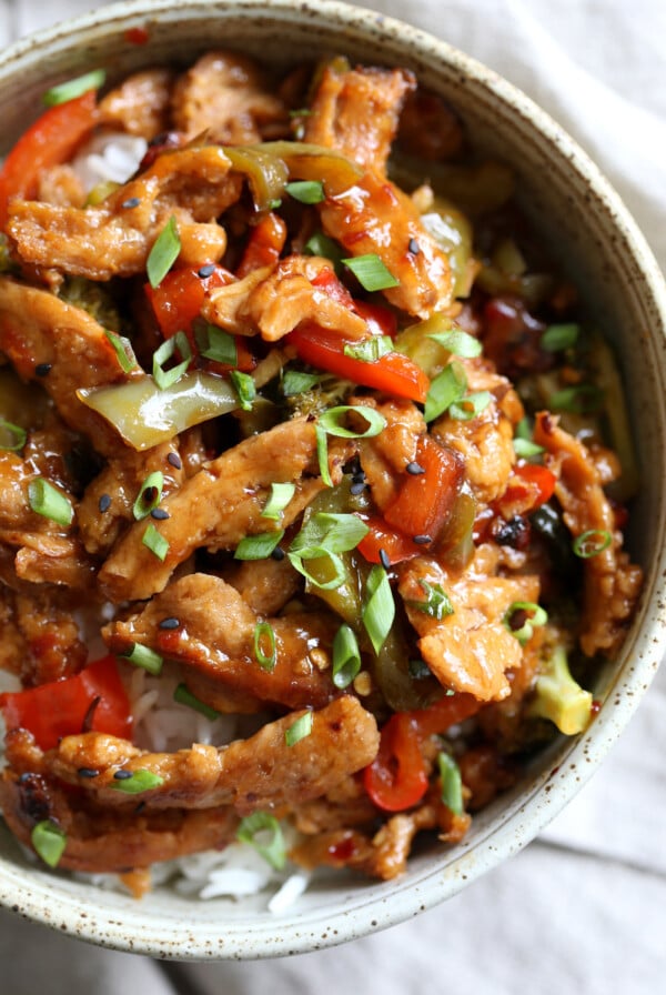 Vegan General Tso Soy curls in a speckled bowl