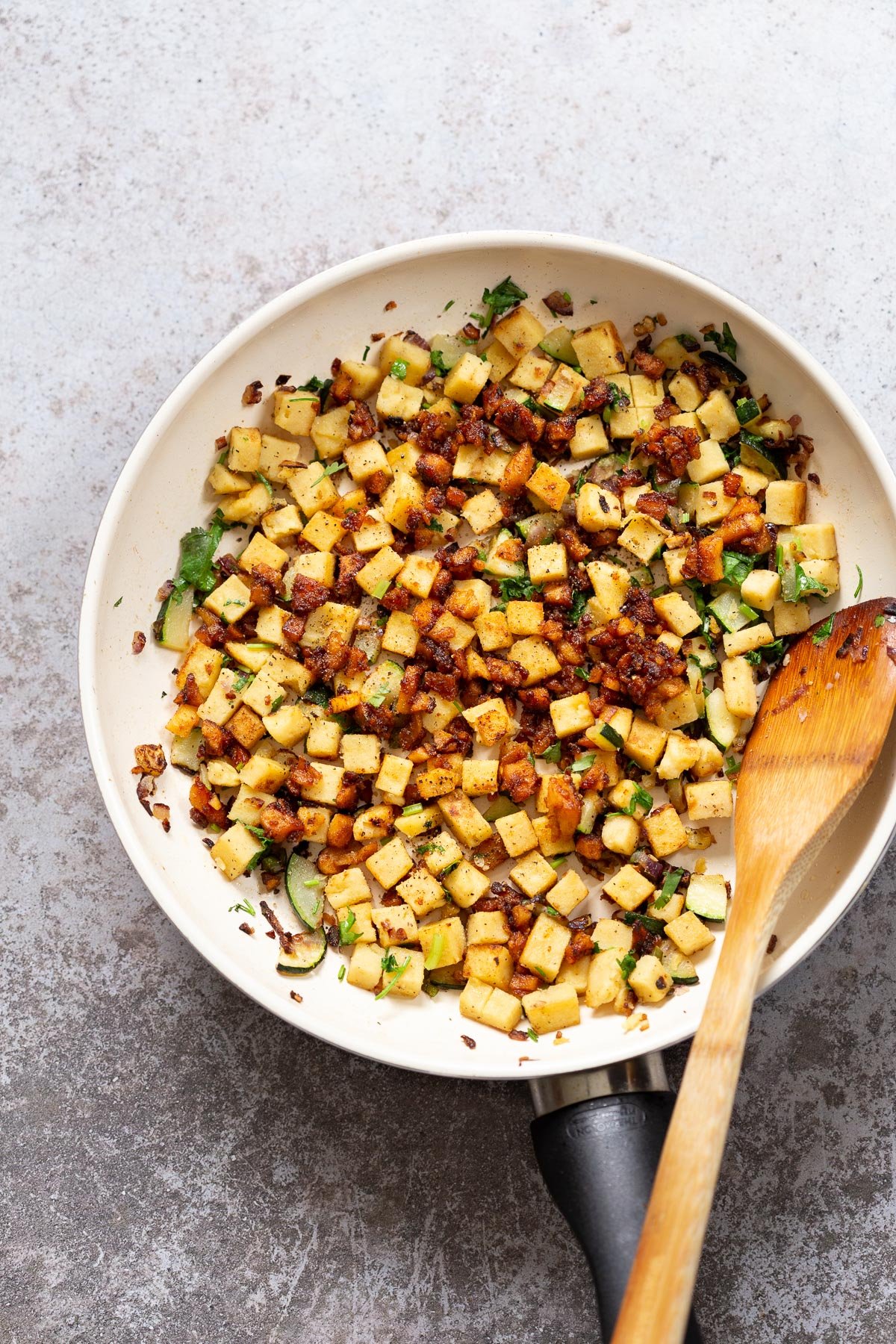 Chickpea Tofu Breakfast Scramble on a white skillet
