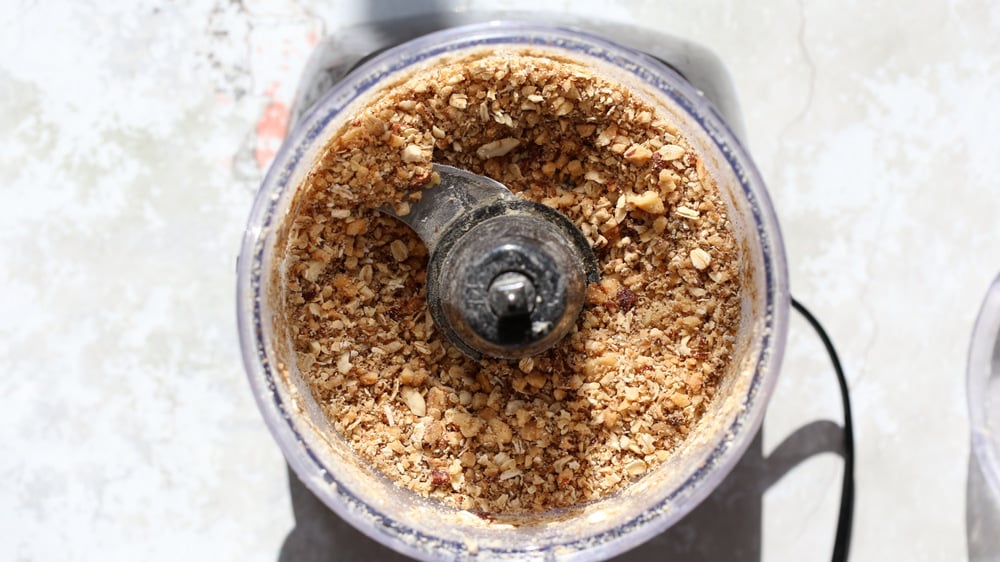 chopped nuts and oats in a small food processor