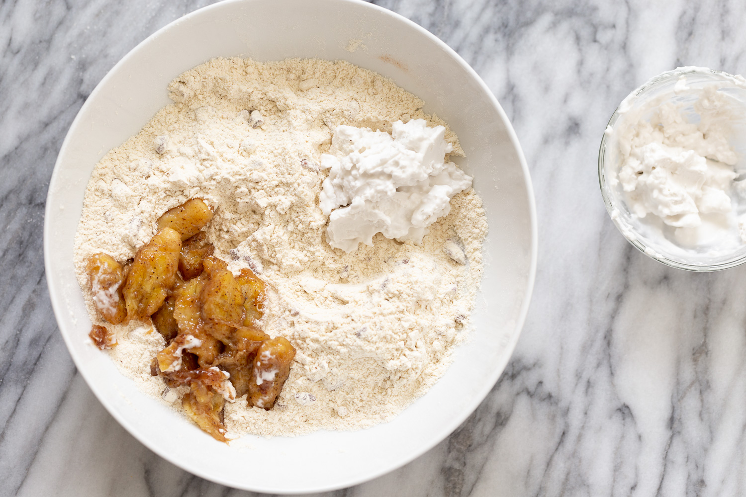 banana scones  ingredients for vegan banana scones in a white bowl