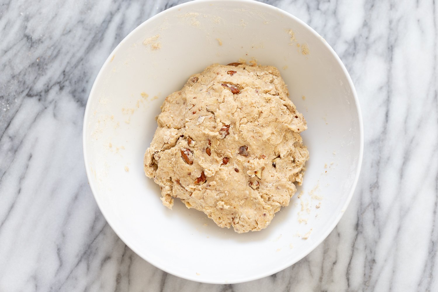 banana scones vegan banana bread scone dough in a white mixing bowl