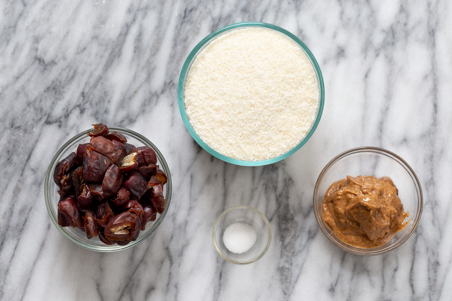 coconut balls  overhead shot of ingredients needed for making vegan date coconut balls
