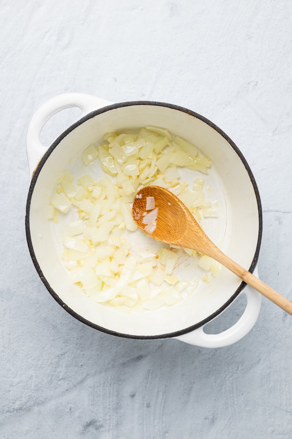 sweet potato curry  onions being sauteed in a pot