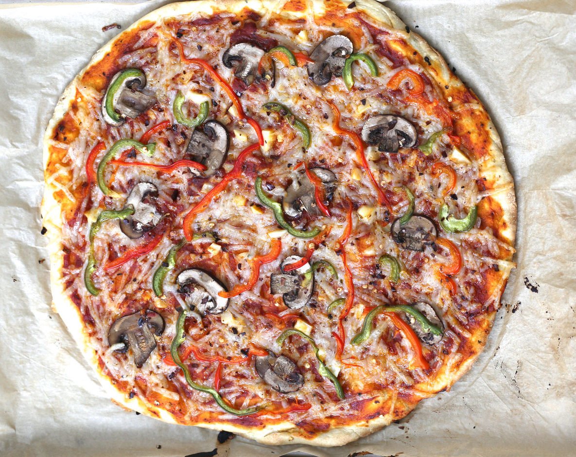 no yeast pizza dough overhead shot of freshly baked vegan pizza made with no yeast