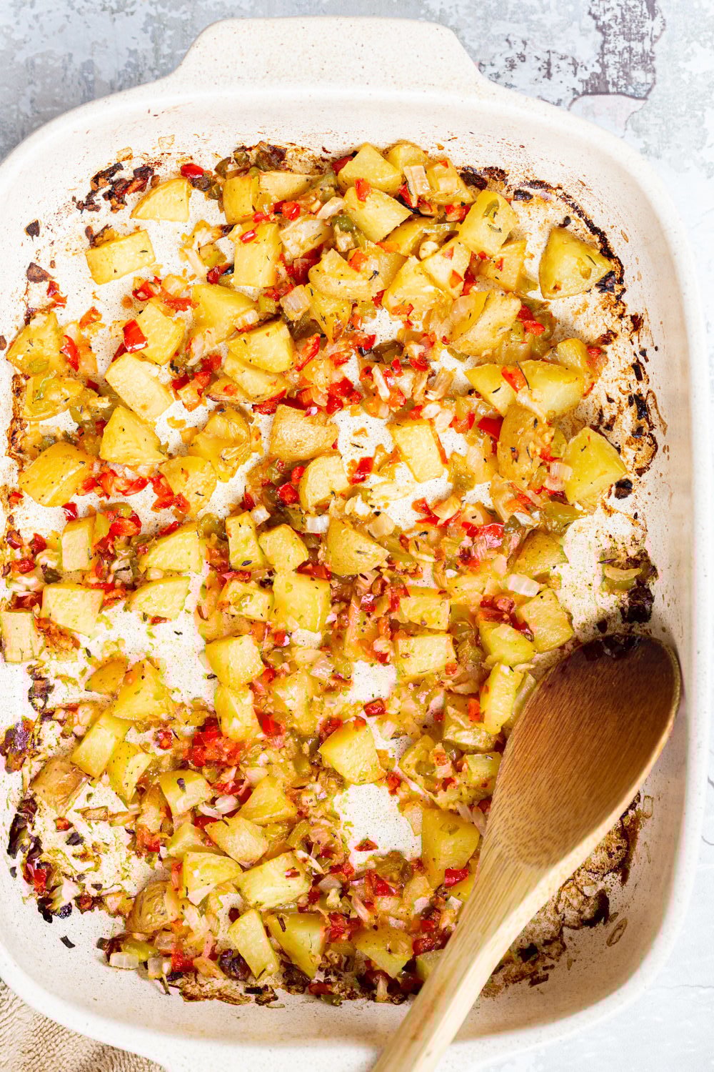 breakfast potatoes easy vegan baked Breakfast Potatoes in a white baking dish
