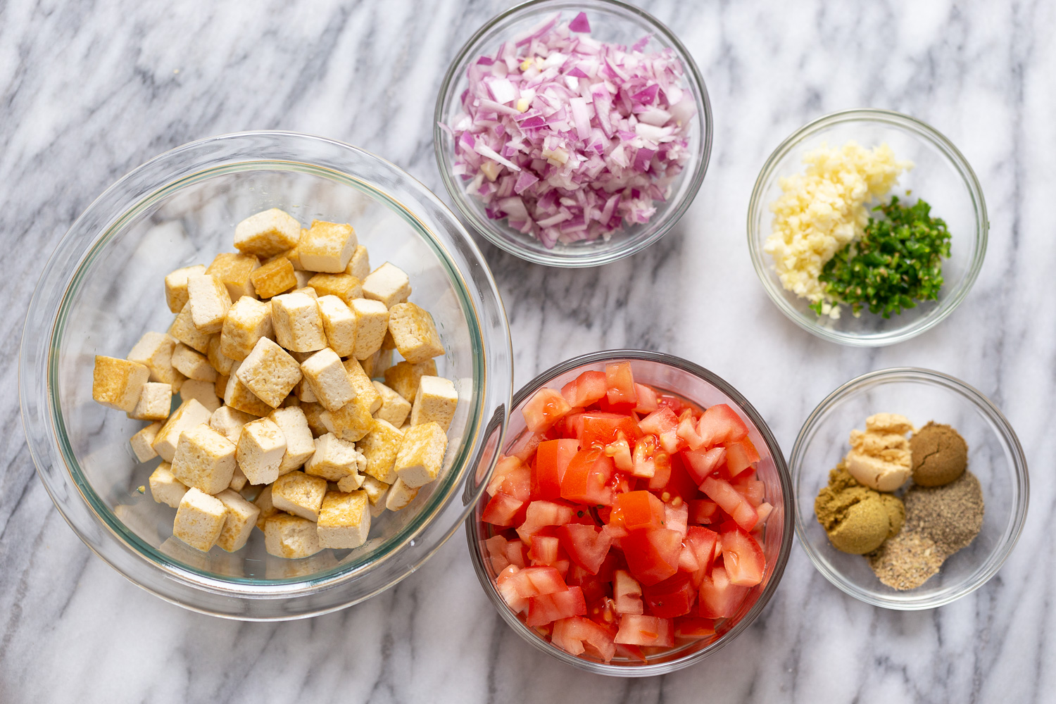 tofu in sauce overhead shot of ingredients needed for making Tofu Dum Kali Mirch