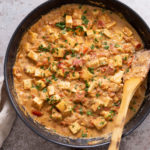 overhead shot of a skillet with kali mirch tofu in black pepper sauce