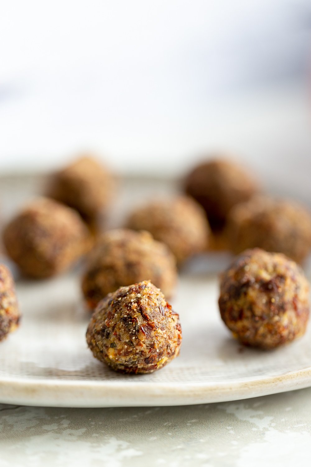 pizza bites gluten-free vegan pizza snack bites on a white plate