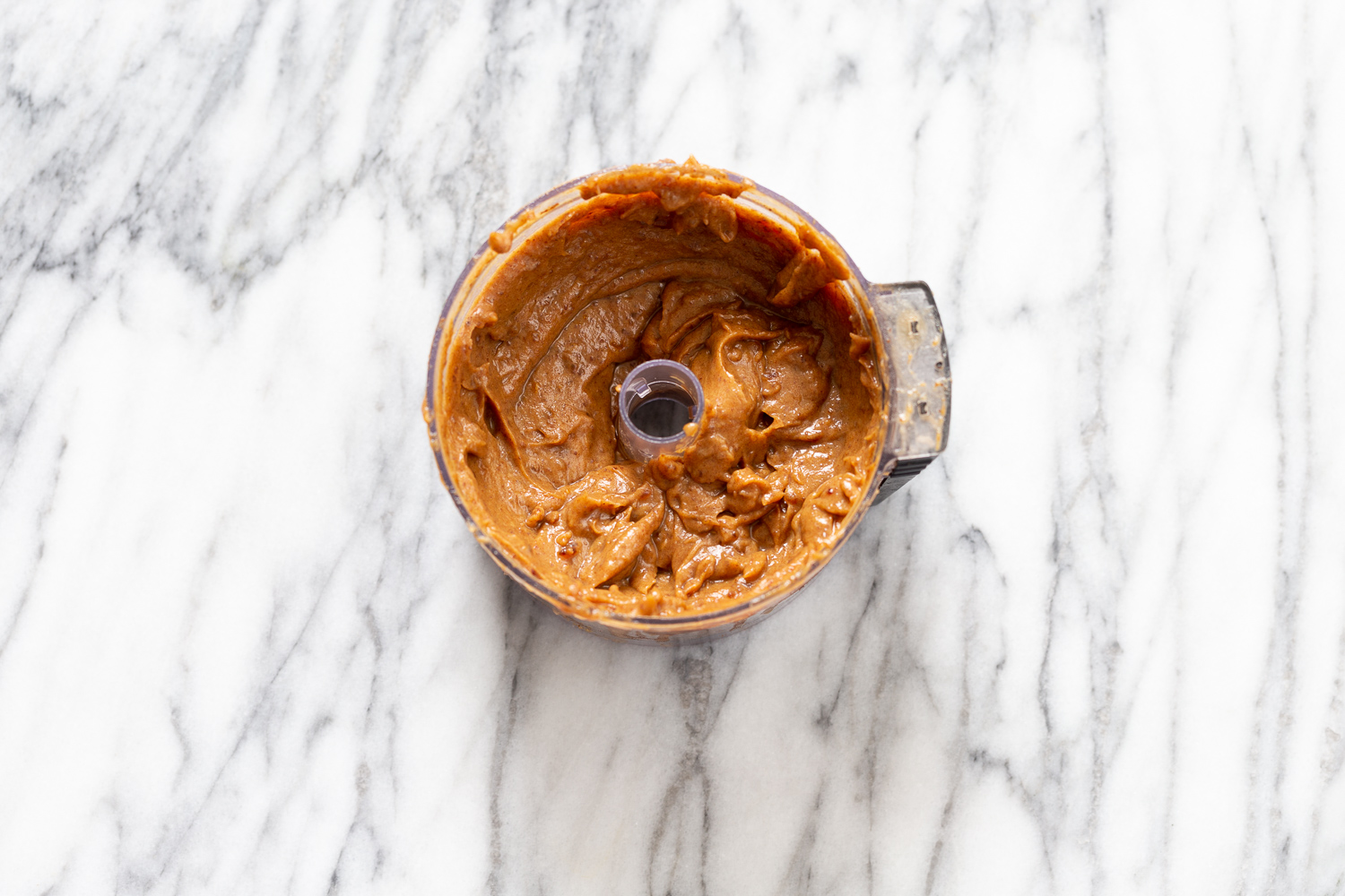 snickers recipe  vegan date caramel in a food processor ready to be used as a filling for snickers