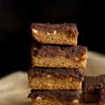 side view of a stack of vegan snickers snack bars