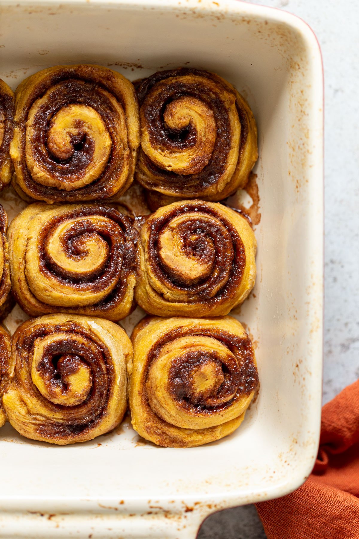 no yeast cinnamon rolls  overhead shot of sweet potato no yeast cinnamon rolls in a casserole dish