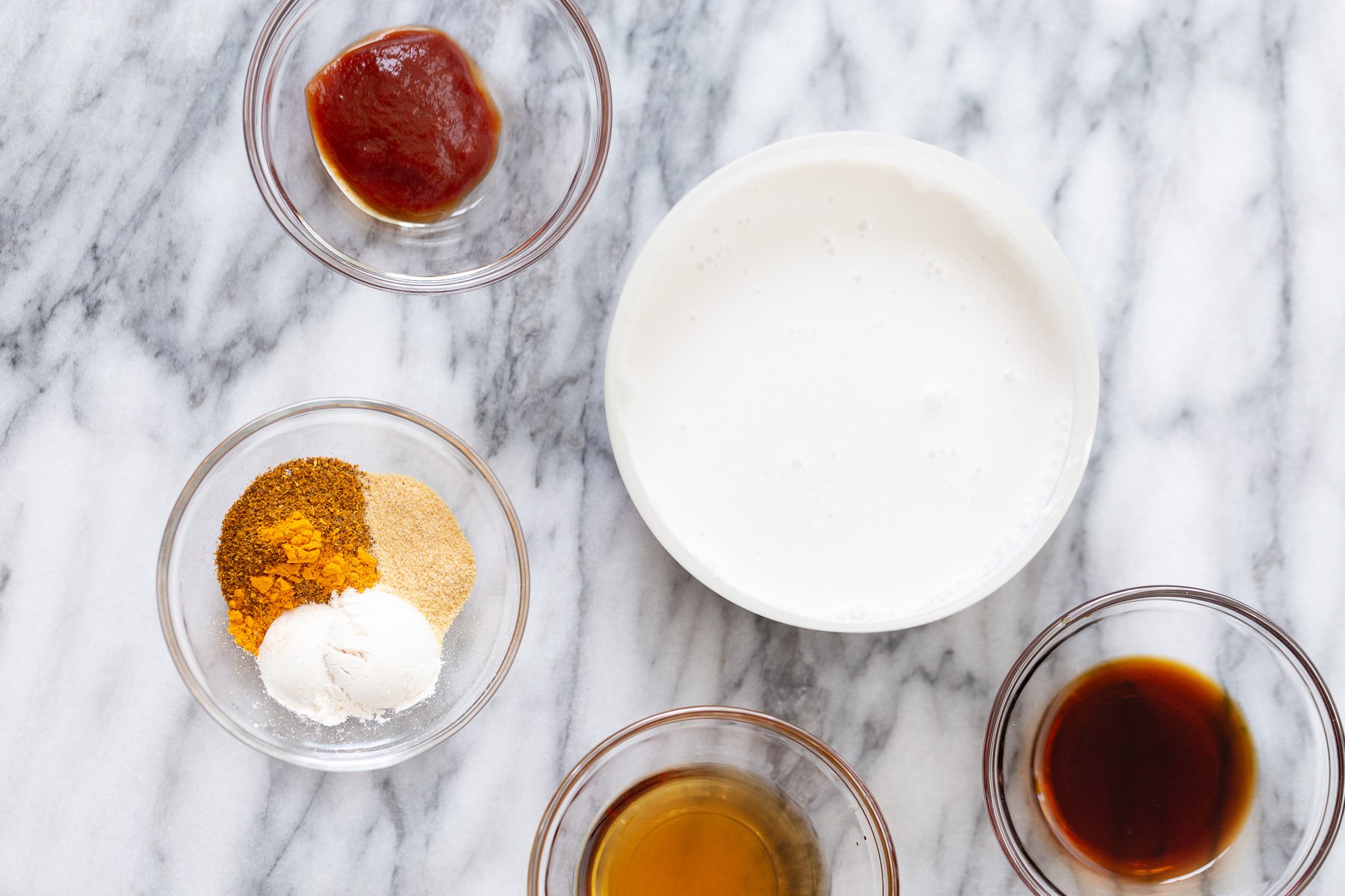 katsu curry  ingredients for making tofu katsu curry on a marble kitchen counter