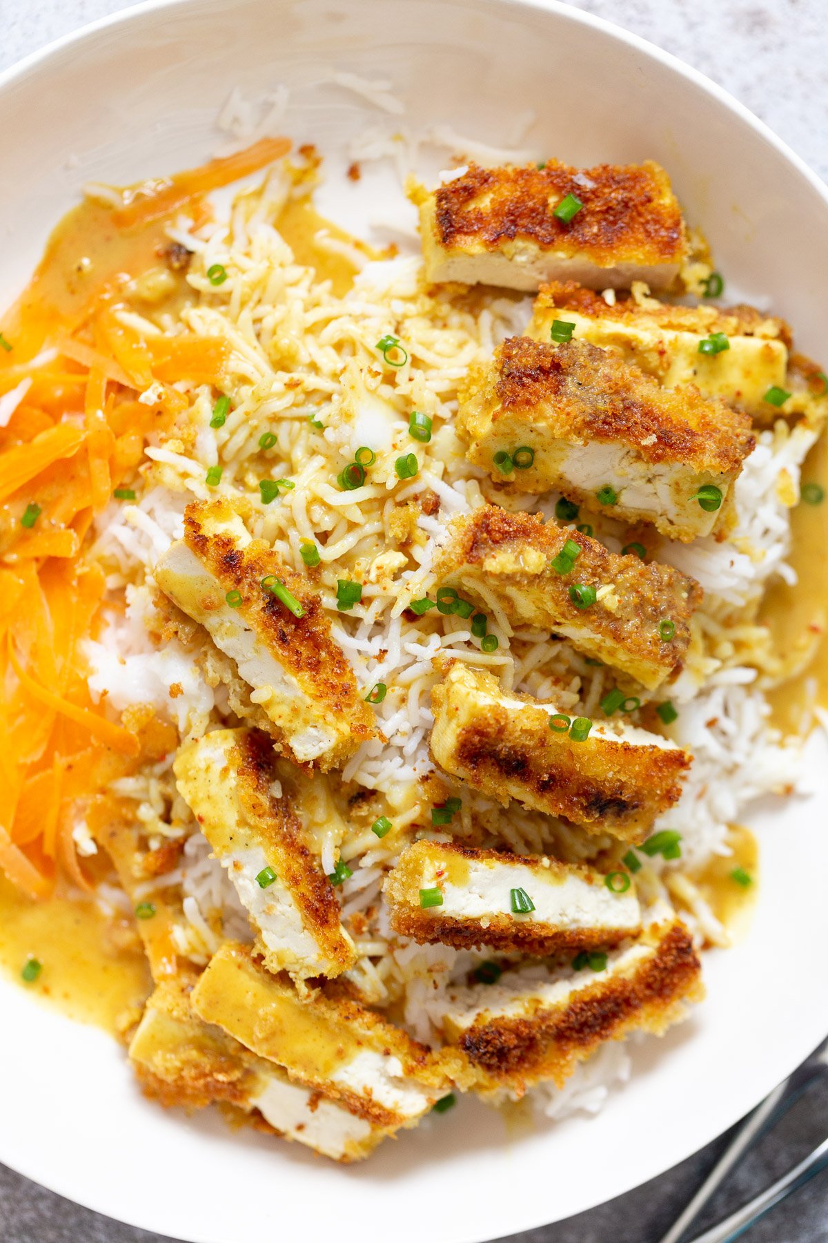 katsu curry  close-up overhead shot of vegan tofu katsu curry