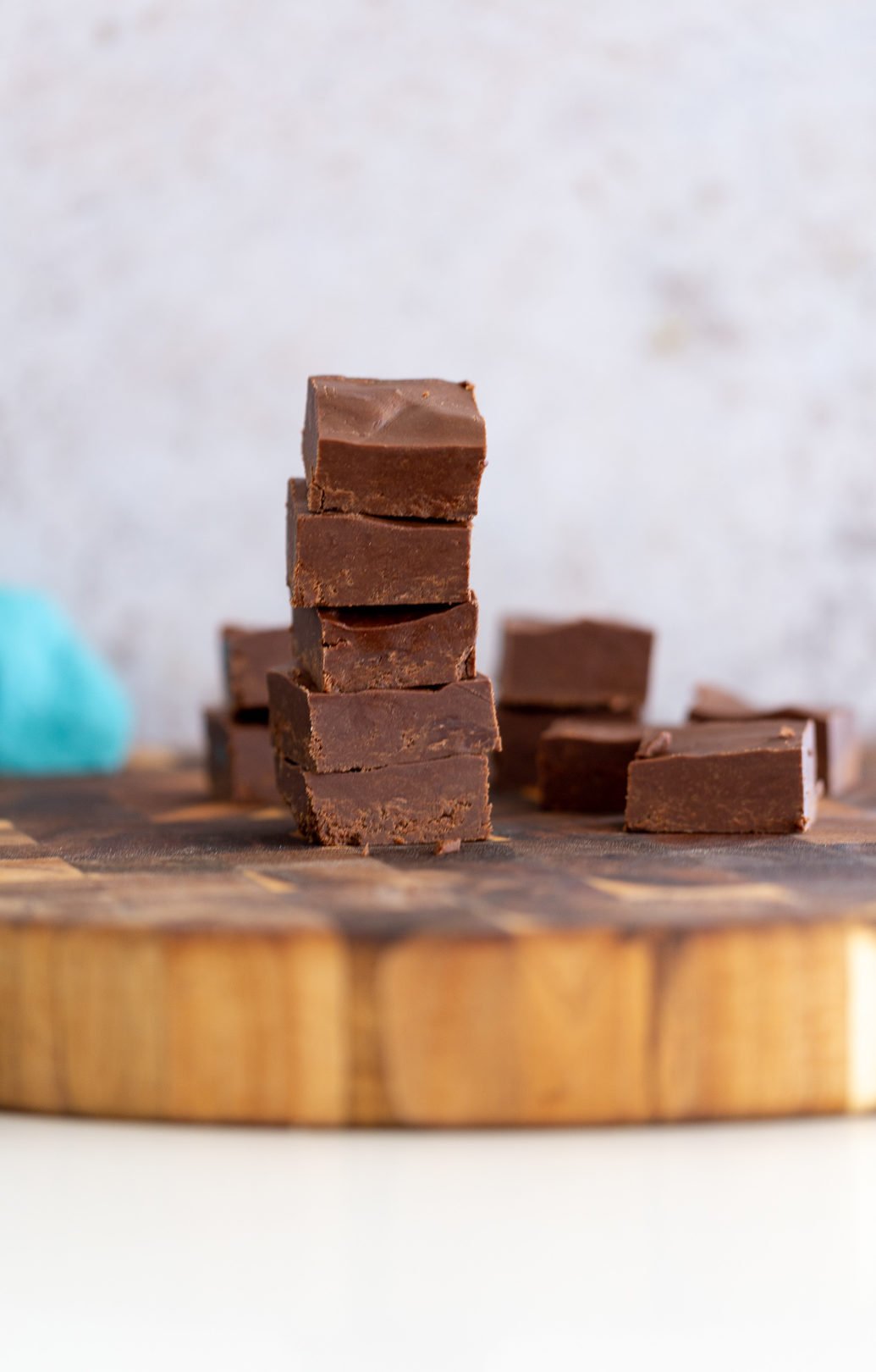 chocolate fudge recipe a stack of easy healthy vegan chocolate fudge on a rustic wooden board