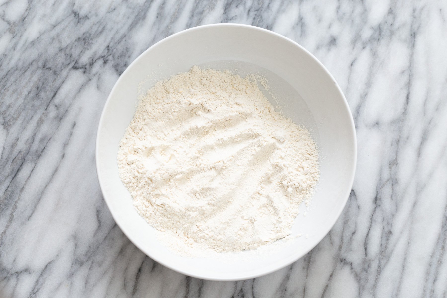 peanut butter and jelly cake  dry cake mix in a white bowl