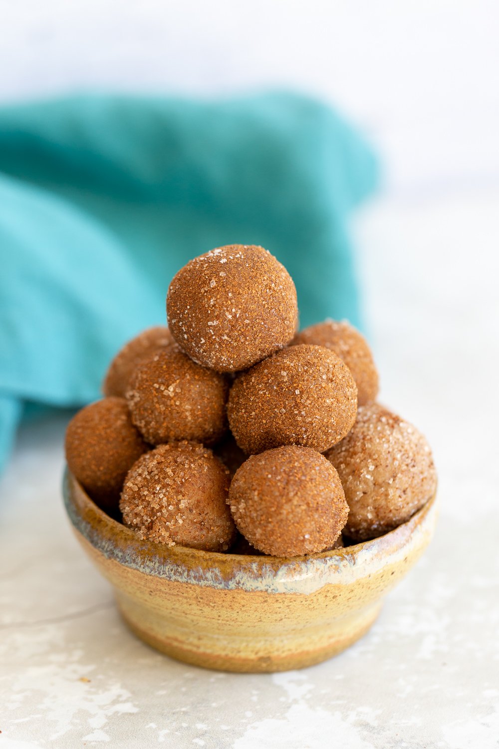 Snickerdoodle Bites  Vegan Snickerdoodle Bites in a small clay bowl