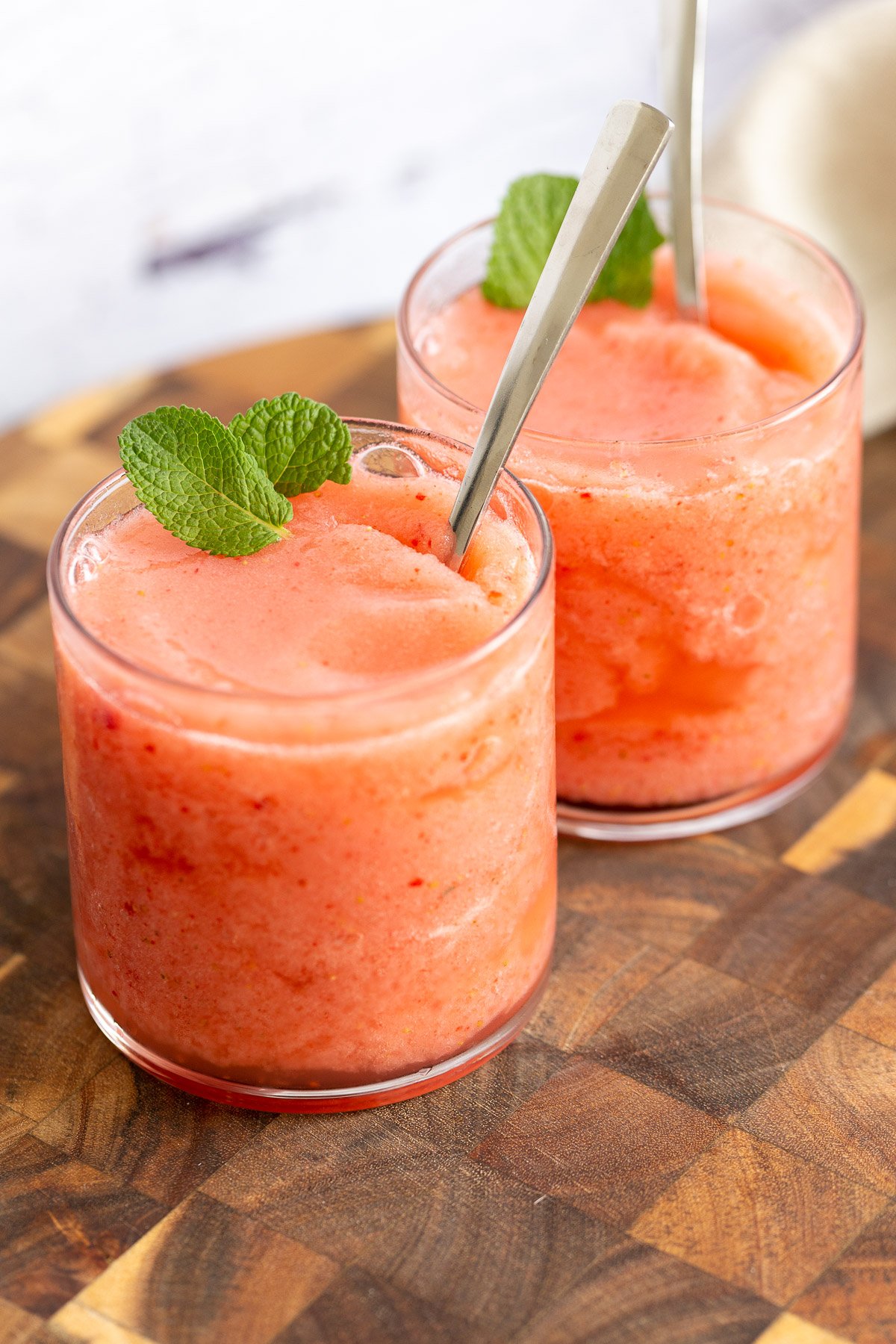 lemonade slushie two vegan strawberry lemonade slushies decorated with mint leaves