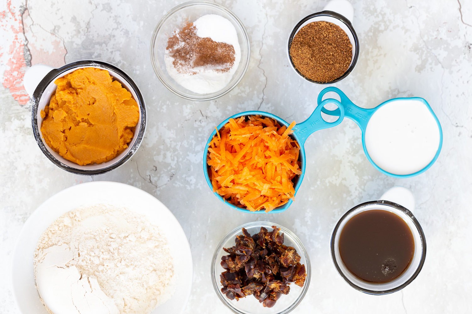 vegan carrot bread ingredients for vegan carrot pumpkin bread on a work surface