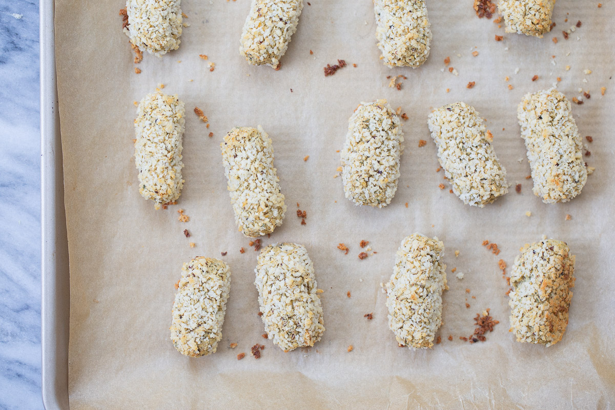vegan croquettes overhead shot of a tray with freshly baked vegan chickpea quinoa croquettes