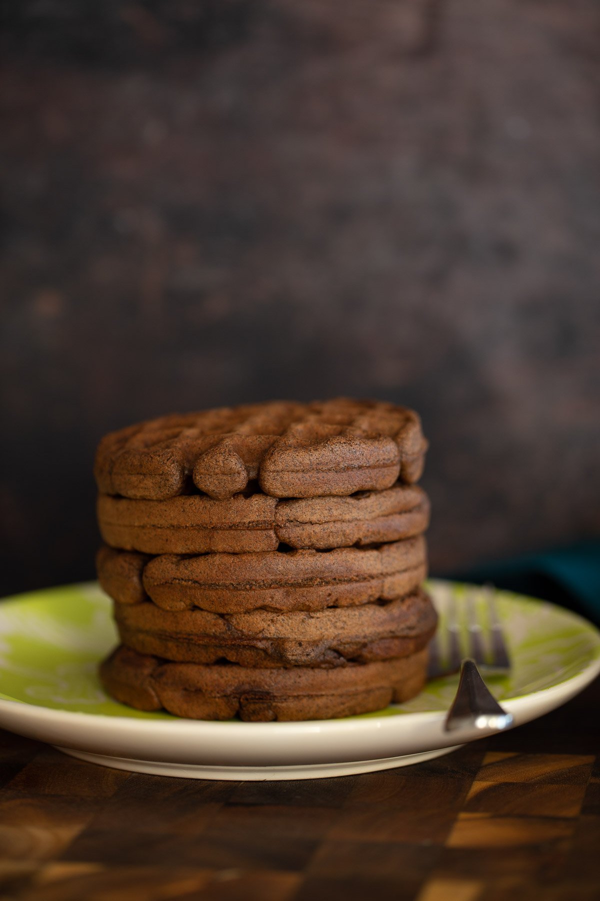 buckwheat waffles a stack of buckwheat oat flour waffles on a green plate