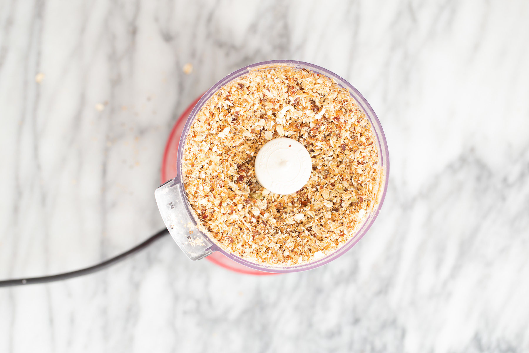 vegan date bars  blended nuts and dates in a food processor